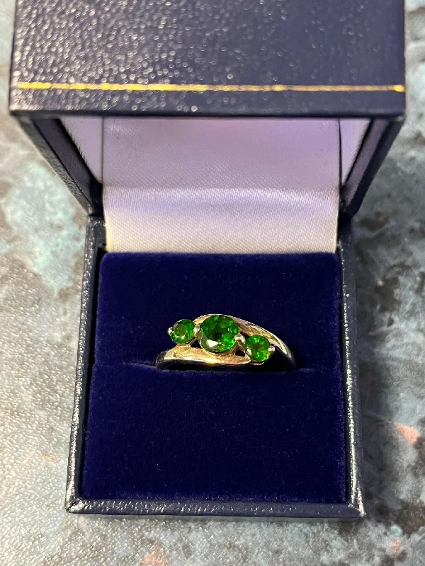 Rings inspired by comets with gem trails -9CT GOLD RING WITH GREEN STONES