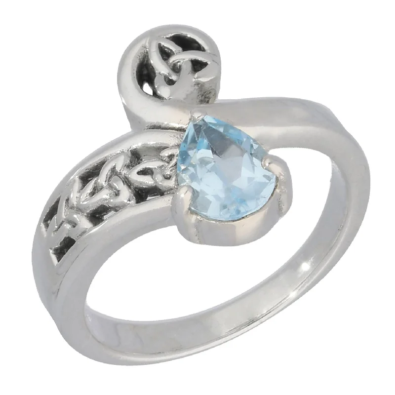 Modern rings with floating gems for sleekness -Celtic Trinity Knot Blue Topaz Bypass Sterling Silver Ring